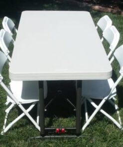 One 6 Foot Table with 6 Folding Chairs